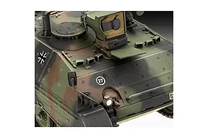 Close-up of a painted 1/35 scale model of a Raketenjagdpanzer Jaguar 1 tank featuring camouflage paint and German military markings.