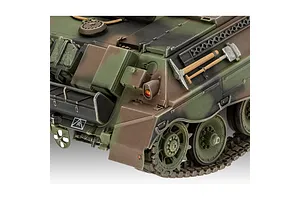 Close-up of a painted 1/35 scale model of a Raketenjagdpanzer Jaguar 1 tank, showing the rear hull, tracks, and mounted tools.