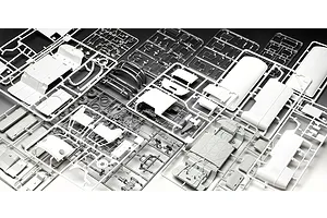 Multiple plastic model kit sprues for a Revell VW T1 Bus model, showing various white and clear plastic parts on a dark background.
