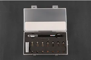 Trumpeter Master Tools rivet maker set in a clear plastic storage case with foam insert, featuring a handle and multiple interchangeable rivet wheels.