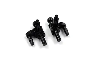 A pair of black aluminium steering knuckles for RC cars against a white background.