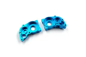Two blue anodized aluminium RC gearbox case halves shown from an internal perspective against a white background.