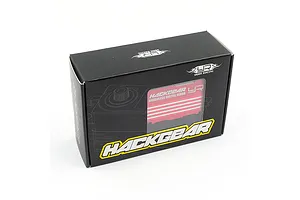 Black cardboard packaging for a Yeah Racing Hackgear brushless digital servo, showing a red metal servo through a clear window.