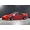 Painted red Pandora RC Nissan 180SX Kouki body shell mounted on an RC drift car chassis against a dark background.