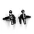 A pair of black anodized aluminium steering knuckles for RC cars by Yeah Racing, featuring ball joints and engraved branding.