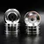 Four silver aluminium RC car rims arranged in two stacks against a black background.