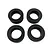Four black circular foam tyre inserts arranged in a two-by-two grid on a white background.