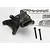 Traxxas Revo wheelie bar mount part with two mounting screws and instruction sheet in the background.