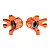 Two orange anodized aluminium front steering hubs for RC cars by GPM Racing, featuring pre-installed bearings and L/R markings.