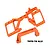 GPM Racing orange anodized aluminium servo mount set for RC cars, featuring a main bracket and a separate support brace on a white background.