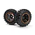 Two BlackZon Spryte RC car wheels with black rubber tyres and black rims featuring orange accents, shown against a white background.