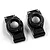 Two black anodized aluminium rear hubs for RC cars by Yeah Racing, shown from a top-down perspective on a white background.