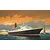 A painting of the Queen Elizabeth 2 ocean liner sailing past the Statue of Liberty at sunset.