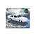 Packaging for a DDA Collectables 1/24 scale Holden A9X Torana plastic model kit featuring a white car model on a blue hexagonal background.