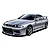 A silver Nissan Skyline R33 GT-R NISMO model car with racing decals, shown from a front three-quarter angle against a white background.
