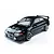 A black 1/10 scale MST RMX 2.5 Mitsubishi Evolution V RC drift car viewed from a high angle against a white background.
