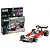 Revell 1/32 scale Surtees TS16/03 Formula 1 model kit box and a fully assembled and painted model car on a white background.