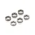 A set of five small metal shielded ball bearings arranged on a white background.
