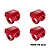 Four red anodized aluminium GPM Racing shock cap protectors arranged in a grid against a white background.