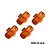 Four orange GPM Racing aluminium 17mm +5mm wheel hex adapters for RC cars, displayed on a white background.