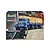 Revell 1/24 scale Büssing 8000 S13 truck with trailer plastic model kit box art showing a blue truck with a tan tarp cover.