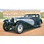 An artistic illustration of a vintage Bugatti Type 41 Coupe Napoleon car parked in front of a grand palace building.