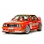 A 1/10 scale Tamiya RC model of a 1992 BMW M3 Sport EVO in iconic orange Jägermeister racing livery, shown from a front three-quarter angle.