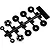 A black plastic sprue containing ten RC shock pistons of various hole configurations, labeled OT209.