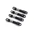 Four small black RC shock absorbers with silver coil springs arranged diagonally on a white background.