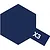 A graphic icon of a dark blue hexagon with a small rectangular tab extending from the bottom right, featuring the white text X3.
