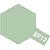 A hexagonal swatch of Tamiya XF-12 J.N. Grey paint color with the text XF12 printed in white on a protruding tab.
