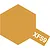 A hexagonal swatch of Tamiya XF-59 Desert Yellow paint with the text XF59 printed in white on a small tab extending from the bottom right.