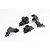 Four black plastic gearbox case components for an FMS RC vehicle arranged on a white background.