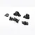A set of four black plastic FMS V2 gearbox case components arranged on a white background.