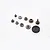 A set of various metal and plastic gears for an RC differential, arranged on a white background.