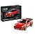 Revell 1/24 scale 1975 Porsche 911 Turbo 50th Anniversary model kit box and a fully assembled red Porsche 911 model car.