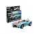 A Revell 1/24 scale '65 Shelby Cobra 427 plastic model kit box displayed alongside a fully assembled and painted light blue and orange model car.