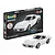 Revell 1/32 scale '69 Corvette plastic model starter kit box and a finished white model car displayed in front.