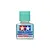A 40ml bottle of Tamiya Low Odour Cement with a light green cap and a blue label featuring the Tamiya logo.