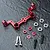 MST red anodized aluminium steering joint plate with included bearings, spacers, and screws on a dark textured surface.