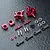 MST aluminium rear hub set in red, including metal hubs, ball ends, turnbuckles, bearings, and screws on a dark textured surface.