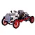 A studio shot of the Teching DM227 classic car metal model kit, featuring a vintage design with red wheels, a silver chassis, and an exposed engine block.
