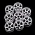 A set of eight white plastic RC car rims with a five-spoke design arranged on a black background.