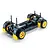 A 1/10 scale RC rally car chassis roller with yellow wheels, black mudflaps, and blue shock absorbers on a white background.
