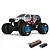 ARRMA Freedom Flyer Grom 1/16 scale RC monster truck with patriotic livery, shown with included Spektrum Smart G2 battery and charger.