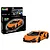 Revell 1/24 scale Lamborghini Revuelto plastic model kit box and a fully assembled, painted orange model car.