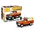 Revell 1/24 scale 1979 Jeep J-10 Pickup with Camper model kit, showing the assembled orange truck model next to its illustrated product box.