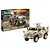Revell 1/35 scale Dingo 2 GE A3.3 PatSi plastic model kit box and a fully assembled, painted model of the armoured vehicle.
