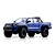 Studio product photo of a blue FMS FCX24M Toyota Tacoma RC rock crawler truck on a white background.