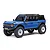 Blue Ford Bronco RC rock crawler studio product shot against a clean white background, showcasing its black roof rack, white wheels, and aggressive tread tires.